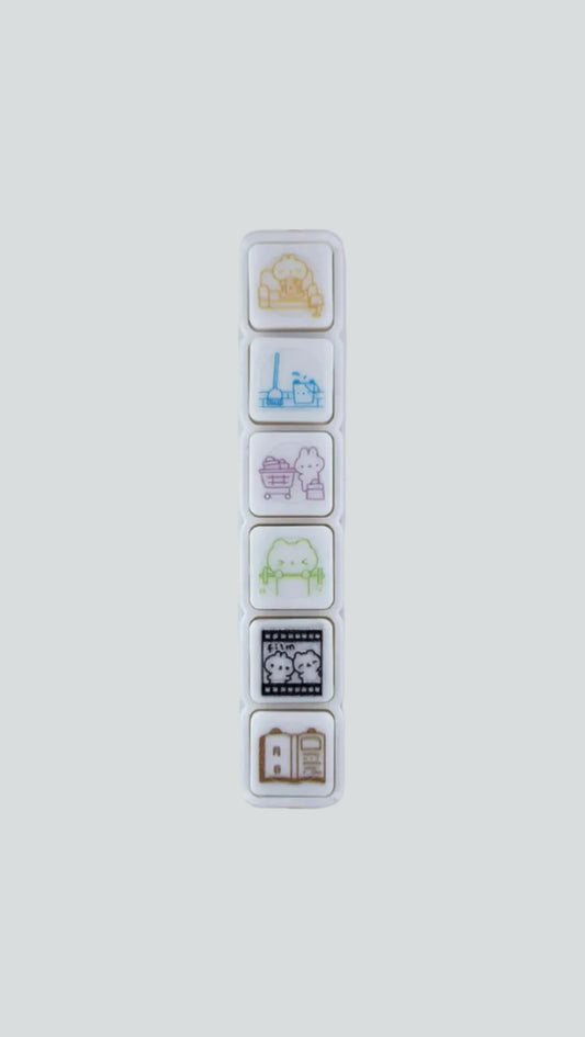 WakaWaka Bunny Productivity 6-button push stamp featuring six self-inking, habit-tracking bunny icons.