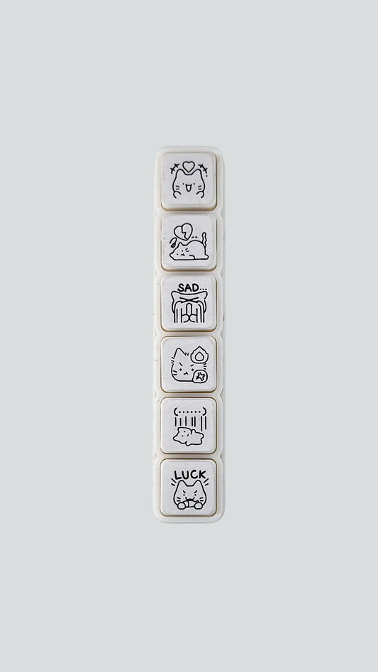 Simno Cat Emotions 6-button push stamp showing its six self-inking, emotion-themed cat icons.